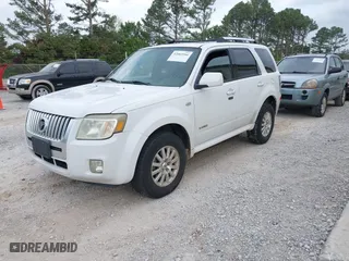 2008 Mercury Mariner Premier with VIN 4M2CU87118KJ11472, listed as a IAAI auction lot 42063566 with 128,274 mi miles. Bid and sale history available at carsss.com. Image 2.
