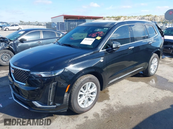 2024 Cadillac XT6 FWD Luxury with VIN 1GYKPAR47RZ712556, listed as a IAAI auction lot 40646808 with 1 mi miles. Bid and sale history available at carsss.com. Image 23.