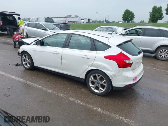 2014 Ford Focus Titanium with VIN 1FADP3N24EL184220, listed as a IAAI auction lot 42429610 with 172,575 mi miles and . Bid and sale history available at DreamBid. Image 3.