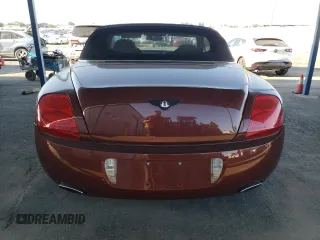 2007 Bentley Continental GT with VIN SCBDR33W77C047935, listed as a Copart auction lot 60557985 with 61,661 mi miles and Salvage title. Bid and sale history available at DreamBid. Image 6.