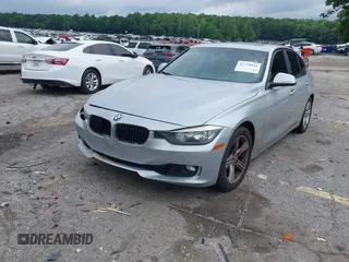 2012 BMW 3 Series 328i with VIN WBA3A5C50CF349365, listed as a IAAI auction lot 42379944 with 193,548 mi miles and . Bid and sale history available at DreamBid. Image 2.