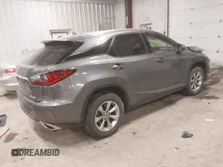 2019 Lexus RX with VIN 2T2BZMCA5KC197990, listed as a IAAI auction lot 41739917 with 74,469 mi miles. Bid and sale history available at carsss.com. Image 4.