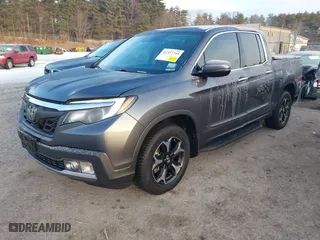 2020 Honda Ridgeline RTL-E with VIN 5FPYK3F70LB008292, listed as a IAAI auction lot 41357744 with 81,961 mi miles. Bid and sale history available at carsss.com. Image 2.