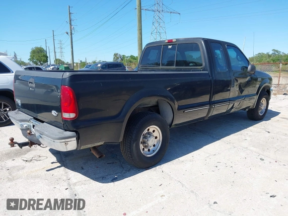 1999 Ford F-250 XL with VIN 1FTNX20LXXEA49775, listed as a IAAI auction lot 41825626 with 141,767 mi miles and . Bid and sale history available at DreamBid. Image 4.
