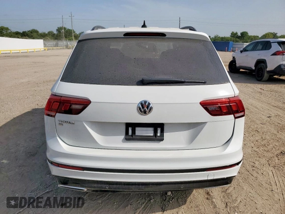 2021 Volkswagen Tiguan SE z VIN 3VV3B7AX9MM003432, wystawiony jako Copart lot #63422315 z przebiegiem 64 531 mil mil oraz Czysty tytuł • Clean title. Historia ofert i sprzedaży dostępna na DreamBid. Obrazek 6.