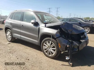 2013 Volkswagen Tiguan SE with VIN WVGAV7AX7DW018388, listed as a Copart auction lot 56188045 with 98,066 mi miles and Salvage title. Bid and sale history available at DreamBid. Image 4.