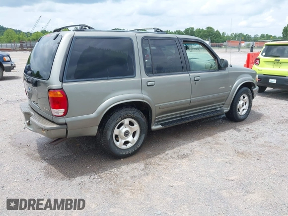 2000 Ford Explorer z VIN 1FMZU85P9YUB30553, wystawiony jako IAAI lot #42503777 z przebiegiem 209 062 mil mil oraz . Historia ofert i sprzedaży dostępna na DreamBid. Obrazek 4.