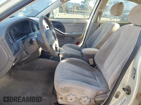 2004 Hyundai Elantra GLS z VIN KMHDN46D64U919337, wystawiony jako Copart lot #54627945 z przebiegiem 184 087 mil mil oraz Szkoda całkowita • Salvage title. Historia ofert i sprzedaży dostępna na DreamBid. Obrazek 7.