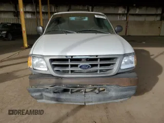 2001 Ford F-150 XL with VIN 2FTPF17Z41CA93204, listed as a Copart auction lot 86637324 with 121,331 mi miles and Salvage title. Bid and sale history available at DreamBid. Image 5.