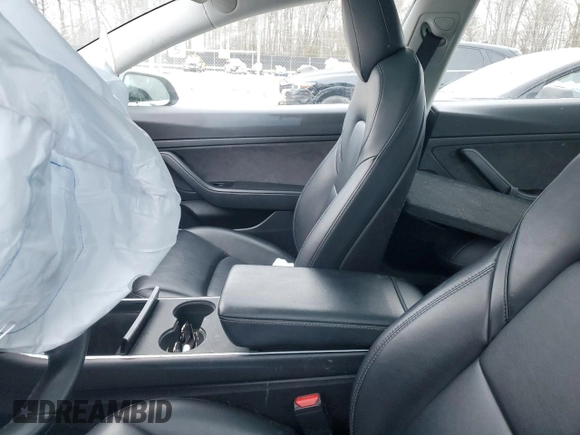 2020 Tesla Model 3 Standard Range Plus with VIN 5YJ3E1EAXLF661031, listed as a Copart auction lot 87912605 with Not Provided miles and Salvage Title. Bid and sale history available at DreamBid. Image 7.