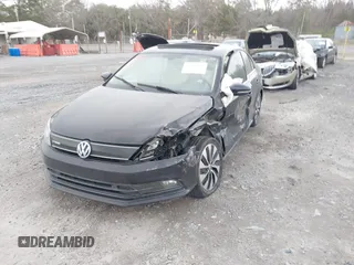 2015 Volkswagen Jetta Sedan Hybrid SEL Premium with VIN 3VW637AJXFM314288, listed as a IAAI auction lot 41715001 with 152,484 mi miles. Bid and sale history available at carsss.com. Image 2.