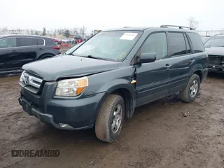 2006 Honda Pilot EX with VIN 5FNYF18496B021499, listed as a IAAI auction lot 41540784 with 232,665 mi miles and . Bid and sale history available at DreamBid. Image 2.