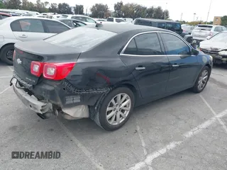 2013 Chevrolet Malibu LTZ with VIN 1G11H5SA2DU125573, listed as a IAAI auction lot 42047422 with 165,493 mi miles and . Bid and sale history available at DreamBid. Image 4.