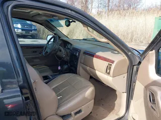 2004 Jeep Grand Cherokee Limited with VIN 1J4GW58N74C120435, listed as a IAAI auction lot 41815094 with 193,056 mi miles. Bid and sale history available at carsss.com. Image 5.