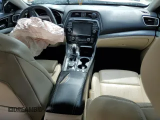 2017 Nissan Maxima SV z VIN 1N4AA6AP6HC370854, wystawiony jako Copart lot #60374645 z przebiegiem 151 160 mil mil oraz Czysty tytuł • Clean title. Historia ofert i sprzedaży dostępna na DreamBid. Obrazek 8.