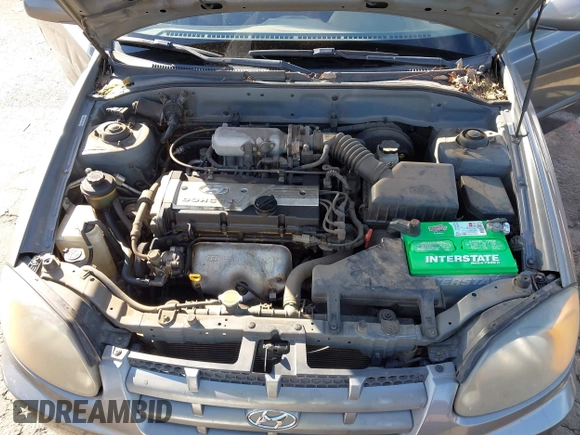 2004 Hyundai Accent GL with VIN KMHCG45C04U531177, listed as a IAAI auction lot 41526033 with 126,102 mi miles. Bid and sale history available at carsss.com. Image 10.
