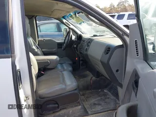 2007 Ford F-150 XL with VIN 1FTRF12W17NA26892, listed as a IAAI auction lot 41011688 with 158,088 mi miles. Bid and sale history available at carsss.com. Image 5.