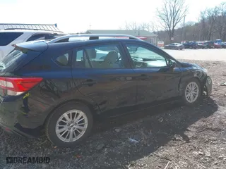 2017 Subaru Impreza Premium with VIN 4S3GTAD65H3716428, listed as a IAAI auction lot 41942299 with 77,181 mi miles. Bid and sale history available at carsss.com. Image 14.