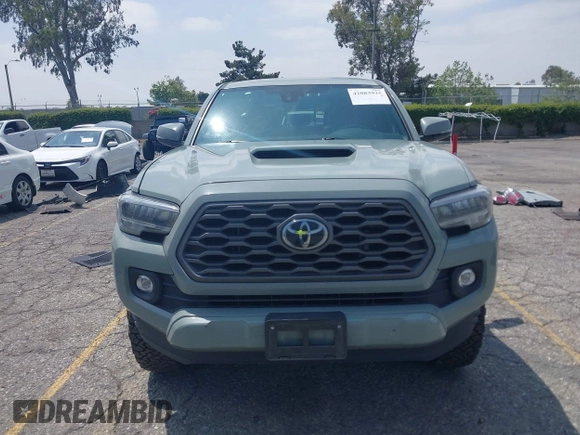 2022 Toyota Tacoma SR5 with VIN 3TMBZ5DN1NM035572, listed as a IAAI auction lot 42083925 with 82,596 mi miles and . Bid and sale history available at DreamBid. Image 13.
