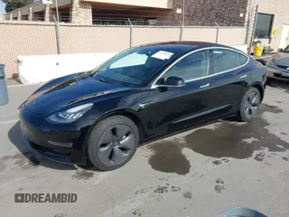 2019 Tesla Model 3 Mid Range with VIN 5YJ3E1EA2KF305834, listed as a IAAI auction lot 41719610 with 126,333 mi miles and . Bid and sale history available at DreamBid. Image 19.