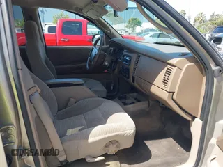 2003 Dodge Durango SLT z VIN 1D4HS48N43F517701, wystawiony jako IAAI lot #42277135 z przebiegiem 135 521 mil mil oraz . Historia ofert i sprzedaży dostępna na DreamBid. Obrazek 5.