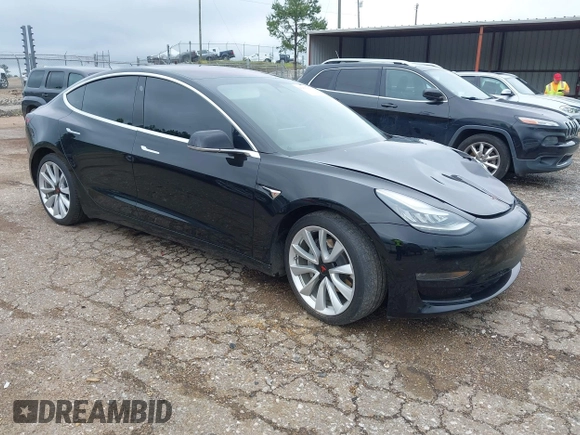 2018 Tesla Model 3 Long Range Battery z VIN 5YJ3E1EB3JF186733, wystawiony jako IAAI lot #42093891 z przebiegiem 102 435 mil mil oraz . Historia ofert i sprzedaży dostępna na DreamBid. Obrazek 1.