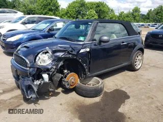 2012 MINI Convertible S with VIN WMWZP3C58CT550011, listed as a Copart auction lot 57512034 with 71,366 mi miles and Salvage Title. Bid and sale history available at DreamBid. Image 1.