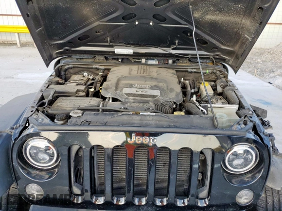 2015 Jeep Wrangler Freedom Edition with VIN 1C4AJWAG8FL541675, listed as a Copart auction lot 62647855 with 53,915 mi miles and Salvage title. Bid and sale history available at DreamBid. Image 12.
