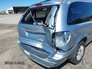 2005 Chrysler Town & Country Touring with VIN 2C4GP54L05R284612, listed as a IAAI auction lot 41839207 with 162,175 mi miles and . Bid and sale history available at DreamBid. Image 21.
