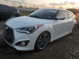 2016 Hyundai Veloster Turbo z VIN KMHTC6AE7GU291614, wystawiony jako Copart lot #85368454 z przebiegiem 174 781 mil mil oraz Czysty tytuł • Clean title. Historia ofert i sprzedaży dostępna na DreamBid. Obrazek 1.