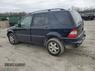 2002 Mercedes-Benz M-Class with VIN 4JGAB75E12A316799, listed as a Copart auction lot 51970785 with 176,915 mi miles and Salvage Title. Bid and sale history available at carsss.com. Image 2.
