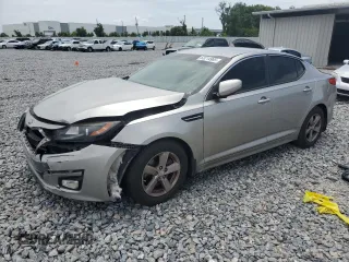 2015 Kia Optima LX z VIN 5XXGM4A75FG360331, wystawiony jako Copart lot #63214985 z przebiegiem 128 277 mil mil oraz Szkoda całkowita • Salvage title. Historia ofert i sprzedaży dostępna na DreamBid. Obrazek 1.