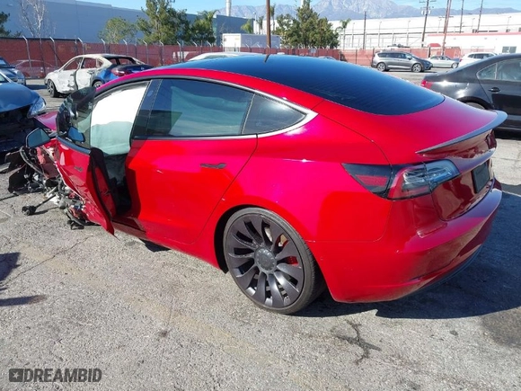 2021 Tesla Model 3 Performance with VIN 5YJ3E1EC7MF997237, listed as a IAAI auction lot 41387544 with 64,450 mi miles. Bid and sale history available at carsss.com. Image 3.