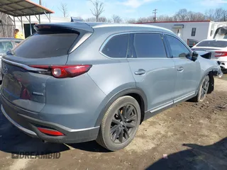 2021 Mazda CX-9 Grand Touring with VIN JM3TCBDY1M0505302, listed as a IAAI auction lot 41649151 with 67,183 mi miles and . Bid and sale history available at carsss.com. Image 4.