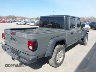 2020 Jeep Gladiator Sport S z VIN 1C6HJTAG7LL154664, wystawiony jako IAAI lot #42033131 z przebiegiem 73 282 mil mil oraz . Historia ofert i sprzedaży dostępna na DreamBid. Obrazek 4.