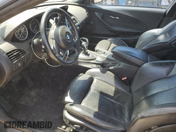 2009 BMW 6 Series 650i z VIN WBAEA535X9CV92734, wystawiony jako Copart lot #52678395 z przebiegiem 237 588 mil mil oraz Czysty tytuł • Clean title. Historia ofert i sprzedaży dostępna na DreamBid. Obrazek 7.