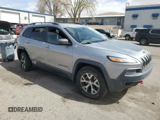 2015 Jeep Cherokee Trailhawk with VIN 1C4PJMBS3FW787033, listed as a Copart auction lot 49176735 with 83,013 mi miles and Salvage Title. Bid and sale history available at carsss.com. Image 4.