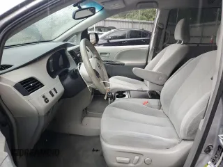 2012 Toyota Sienna LE AAS with VIN 5TDKK3DC8CS224112, listed as a Copart auction lot 59701725 with 200,726 mi miles and Salvage title. Bid and sale history available at DreamBid. Image 7.