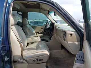2005 Chevrolet Suburban Z71 with VIN 3GNFK16Z05G242037, listed as a IAAI auction lot 40719140 with 164,409 mi miles. Bid and sale history available at carsss.com. Image 5.