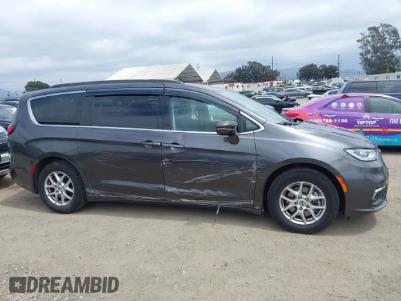 2022 Chrysler Pacifica Touring L z VIN 2C4RC1BG0NR134194, wystawiony jako IAAI lot #42082795 z przebiegiem 98 845 mil mil oraz . Historia ofert i sprzedaży dostępna na DreamBid. Obrazek 14.