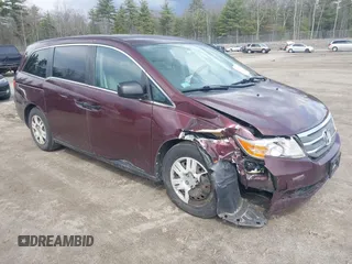 2013 Honda Odyssey LX with VIN 5FNRL5H26DB010444, listed as a IAAI auction lot 42039693 with 173,863 mi miles and . Bid and sale history available at carsss.com. Image 1.