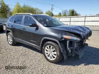 2014 Jeep Cherokee Limited with VIN 1C4PJMDB2EW212398, listed as a Copart auction lot 54723835 with 202,008 mi miles and Salvage title. Bid and sale history available at DreamBid. Image 4.