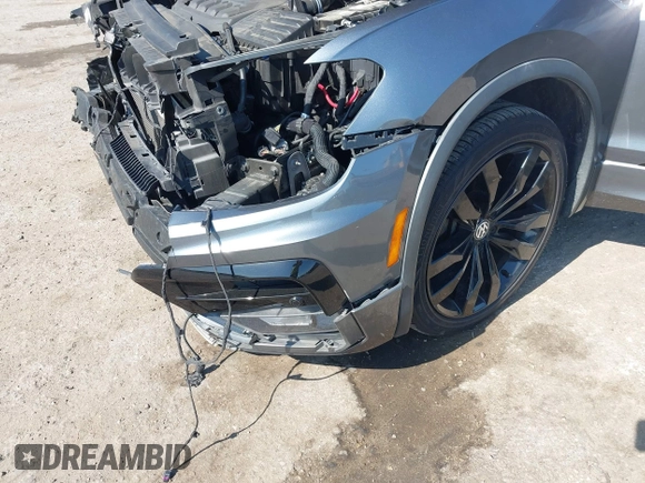 2020 Volkswagen Tiguan SE with VIN 3VV3B7AX3LM176300, listed as a IAAI auction lot 42004744 with 86,074 mi miles and . Bid and sale history available at DreamBid. Image 6.
