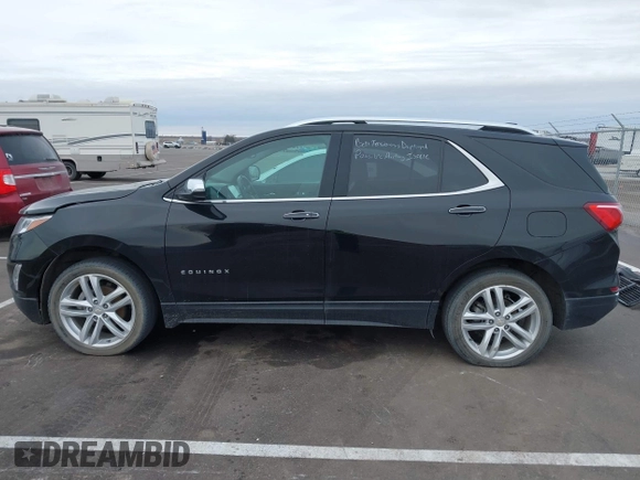 2021 Chevrolet Equinox Premier z VIN 2GNAXXEV4M6118442, wystawiony jako IAAI lot #41392148 z przebiegiem 92 170 mil mil oraz . Historia ofert i sprzedaży dostępna na DreamBid. Obrazek 15.