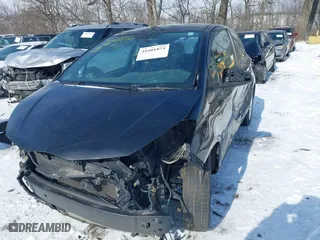 2015 Toyota Yaris L with VIN VNKJTUD34FA055116, listed as a IAAI auction lot 41601874 with 84,508 mi miles. Bid and sale history available at carsss.com. Image 2.