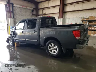 2012 Nissan Titan S with VIN 1N6AA0EC7CN311143, listed as a Copart auction lot 75181784 with 214,351 mi miles and Salvage Title. Bid and sale history available at carsss.com. Image 2.