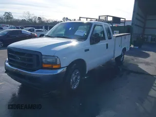 2004 Ford Super Duty F-250 XL with VIN 1FTNX20L44EC45528, listed as a IAAI auction lot 41598042 with 2,163,017 mi miles. Bid and sale history available at carsss.com. Image 2.