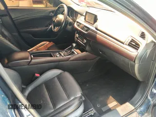 2016 Mazda 6 i Grand Touring с VIN JM1GJ1W55G1430860, выставлен на аукционе IAAI как лот 42485686 с пробегом 121 653 миль миль и . История ставок и продаж доступна на DreamBid. Изображение 5.