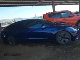 2023 Tesla Model 3 z VIN 5YJ3E1EA2PF557011, wystawiony jako IAAI lot #42347980 z przebiegiem 15 358 mil mil oraz . Historia ofert i sprzedaży dostępna na DreamBid. Obrazek 13.