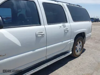 2004 GMC Yukon XL Denali with VIN 1GKFK66U54J166519, listed as a IAAI auction lot 41931676 with 290,082 mi miles. Bid and sale history available at carsss.com. Image 6.